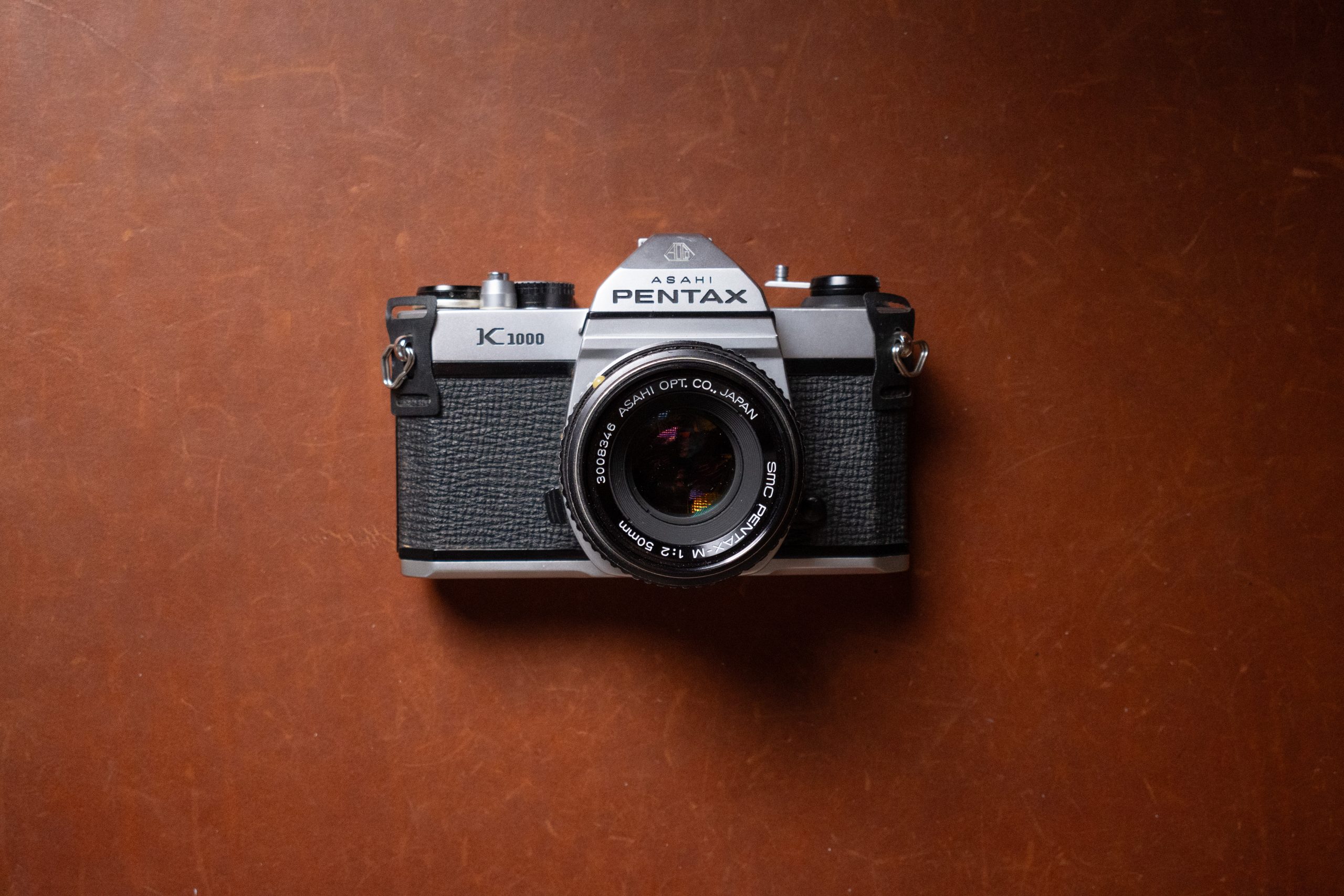 A Pentax K1000 film camera.